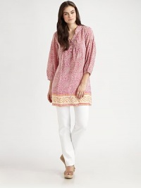 A lively paisley print is perfectly complemented by a pleated front with button details and a relaxed fit.Self-tie detail at v-necklineThree-quarter sleevesAllover printPleated frontContrasting hemAbout 20 from natural waistSilkDry cleanImported A lively paisley print is perfectly complemented by a pleated front with button details and a relaxed fit.Self-tie detail at v-necklineThree-quarter sleevesAllover printPleated frontContrasting hemAbout 20 from natural waistSilkDry cleanImported