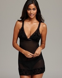 Sparkle and shine in the boudoir with OnGossamer's sheer, velvet-flocked chemise with a back keyhole and side slits. Sparkle and shine in the boudoir with OnGossamer's sheer, velvet-flocked chemise with a back keyhole and side slits.