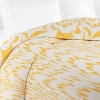 A pop art-inspired play of sunny yellow and bright white wing shapes on this DIANE von FURSTENBERG full/queen duvet refreshes your bedroom decor with versatile contemporary style.