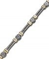 Try a trendy two-tone style. This intricate cable link bracelet is crafted in 14k gold and sterling silver for a versatile touch. Approximate length: 7 inches.