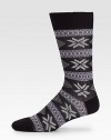 A brilliant print complements these virgin wool socks with a touch of stretch.Mid-calf height80% virgin wool/20% polyamideMachine washMade in Italy