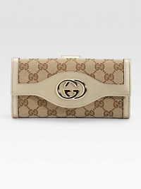 Metallic leather and canvas with GG logo detail in a continental silhouette.Flap and snap closureOne outside snap pocketOne inside zip coin pocketTwo inner bill compartmentsSeven credit card slotsLeather lining7½W X 3½H X 1DMade in Italy Metallic leather and canvas with GG logo detail in a continental silhouette.Flap and snap closureOne outside snap pocketOne inside zip coin pocketTwo inner bill compartmentsSeven credit card slotsLeather lining7½W X 3½H X 1DMade in Italy