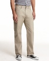 Five pocket straight leg pants in chino color. Classic look and fit. Plain back patch pockets.