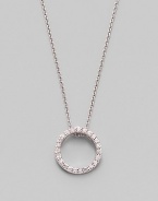 From the Tiny Treasures Collection. A simple circle shimmers and sparkles, outlined in diamonds and dangling from a chain of 18k white gold. Diamonds, 0.10 tcw 18k white gold Chain length, about 16 Pendant diameter, about ½ Lobster clasp Made in Italy