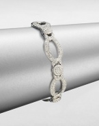 A graceful design featuring links in various shapes accented in pavé crystals. CrystalsRhodium-plated brassLength, about 7.5Box and tongue closureImported 