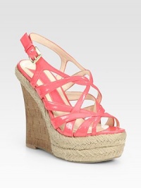 Natural cork wedge enhanced by a maze of shiny leather straps and a classic espadrille platform. Cork-covered wedge, 6 (150mm)Espadrille-covered platform, 2 (50mm)Compares to a 4 heel (100mm)Faux patent leather upperRubber soleImportedOUR FIT MODEL RECOMMENDS ordering true size. Natural cork wedge enhanced by a maze of shiny leather straps and a classic espadrille platform. Cork-covered wedge, 6 (150mm)Espadrille-covered platform, 2 (50mm)Compares to a 4 heel (100mm)Faux patent leather upperRubber soleImportedOUR FIT MODEL RECOMMENDS ordering true size.
