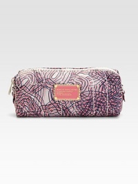 Stash your beauty essentials in this abstract printed nylon case, finished with signature letter stitching. Top zip closureFully lined7½W X 3H X 2½DImported Stash your beauty essentials in this abstract printed nylon case, finished with signature letter stitching. Top zip closureFully lined7½W X 3H X 2½DImported