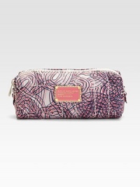 Stash your beauty essentials in this abstract printed nylon case, finished with signature letter stitching. Top zip closureFully lined7½W X 3H X 2½DImported