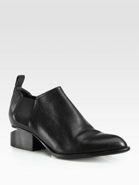 A metal cutout heel modernizes this sleek leather ankle boot with elastic panels for easy on and off access. Stacked heel with metal cutout, 1½ (40mm)Leather upper with elastic panelsPull-on styleLeather lining and solePadded insoleImported A metal cutout heel modernizes this sleek leather ankle boot with elastic panels for easy on and off access. Stacked heel with metal cutout, 1½ (40mm)Leather upper with elastic panelsPull-on styleLeather lining and solePadded insoleImported