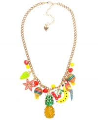 Tropical fruity charms. Betsey Johnson's antique gold tone mixed metal necklace features the most delicious charms: red cherries, yellow banana, green grapes, a pineapple with green details and crystal accents, multi-colored striped beads, and yellow and red faceted beads. Approximate length: 16 inches + 3-inch extender. Approximate drop: 2-1/4 inches. Tropical fruity charms. Betsey Johnson's antique gold tone mixed metal necklace features the most delicious charms: red cherries, yellow banana, green grapes, a pineapple with green details and crystal accents, multi-colored striped beads, and yellow and red faceted beads. Approximate length: 16 inches + 3-inch extender. Approximate drop: 2-1/4 inches.