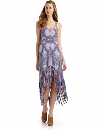THE LOOKTribal-inspired patternV-necklineSleevelessFringed hi-lo hemRacerbackTHE FITAbout 48 from shoulder to longest point of hemTHE MATERIAL65% polyester/33% cotton/2% rayonCARE & ORIGINMachine washImportedModel shown is 5'11 (180cm) wearing US size Small. THE LOOKTribal-inspired patternV-necklineSleevelessFringed hi-lo hemRacerbackTHE FITAbout 48 from shoulder to longest point of hemTHE MATERIAL65% polyester/33% cotton/2% rayonCARE & ORIGINMachine washImportedModel shown is 5'11 (180cm) wearing US size Small.