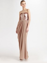 An elegant, artfully draped chiffon skirt is crowned with a shimmering sequined bodice.Strapless sweetheart necklineSequined bodiceGathered, draped skirtConcealed back zipFully linedAbout 48 from natural waistPolyesterSpot cleanImportedModel shown is 5'10½ (179cm) wearing US size 4. An elegant, artfully draped chiffon skirt is crowned with a shimmering sequined bodice.Strapless sweetheart necklineSequined bodiceGathered, draped skirtConcealed back zipFully linedAbout 48 from natural waistPolyesterSpot cleanImportedModel shown is 5'10½ (179cm) wearing US size 4.