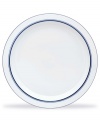 White porcelain dinner plates designed by Dansk master-craftsman Niels Refsgaard, with a style based on the relaxed atmosphere of a welcoming country inn.