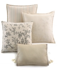 Refined tradition. Elegant velvet ribbon and tassel detailing add touches of modern romance to this cream cotton decorative pillow from Lauren Ralph Lauren. (Clearance) Refined tradition. Elegant velvet ribbon and tassel detailing add touches of modern romance to this cream cotton decorative pillow from Lauren Ralph Lauren. (Clearance)