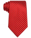 A powerful pattern and bold color pair up to mean serious business in this silk tie from Donald J. Trump.