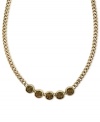 Subtle chic. Jessica Simpson's frontal necklace, crafted from gold-tone mixed metal, features a row of glass light topaz stones for a stylishly understated approach. Approximate length: 16 inches.