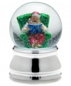 Santa Claus kicks back with a good book, full of beautiful Christmas stories, in this musical snow globe from Towle.