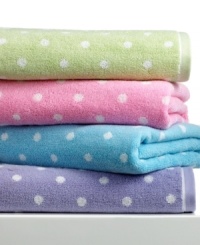 Hit the spot. Put a bit of pep into your daily routine with this brightly-colored Bambini Dots bath towel, featuring whimsical dots on a pure cotton ground for a playful addition to your bathroom. Choose from a range of fun hues. Hit the spot. Put a bit of pep into your daily routine with this brightly-colored Bambini Dots bath towel, featuring whimsical dots on a pure cotton ground for a playful addition to your bathroom. Choose from a range of fun hues.