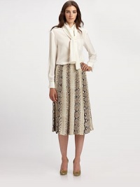 Supple python-printed silk, rendered in a prettily pleated tea-length silhouette.Allover pleatsZip closureAbout 31 from natural waistSilkDry cleanMade in France of imported fabricModel shown is 5'11 (180cm) wearing US size 4. 
