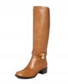 Come along for the ride--and look chic in the process!--with MICHAEL Michael Kors' timelessly elegant Hamilton tall riding boots. Crafted in leather with a low stacked heel, they feature chic logo hardware embellishment on the side.