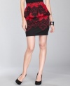A lace-print peplum skirt from INC adds a seductive touch to your evening looks.