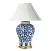 This lamp fashioned in porcelain with ornate floral pattern brings an elegant quality to any room.