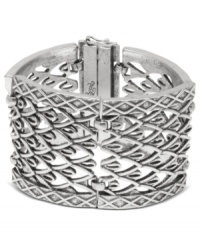 A wonderfully woven link bracelet from Lucky Brand. Boasting a gorgeous, geometric design, it lends a stylish look to any ensemble. Crafted in silver tone mixed metal. Approximate length: 7 inches.