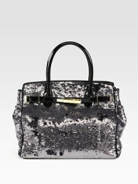 Channel old-Hollywood glamour in this sequined silk carryall finished with patent leather trim.Double top handles, 5¼ dropMagnetic top closureProtective metal feetOne inside zip pocketOne inside leather open pocketSatin lining11W X 13¼H X 6DImported Channel old-Hollywood glamour in this sequined silk carryall finished with patent leather trim.Double top handles, 5¼ dropMagnetic top closureProtective metal feetOne inside zip pocketOne inside leather open pocketSatin lining11W X 13¼H X 6DImported