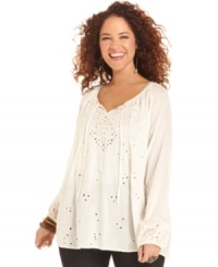 Be a bohemian beauty in Lucky Brand Jeans' plus size peasant top, accented by charming cutouts. Be a bohemian beauty in Lucky Brand Jeans' plus size peasant top, accented by charming cutouts.