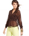 Leopard print makes this Free People chiffon blouse a fashion forward pick for adding a pop of pattern to your winter wardrobe!