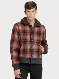 A slightly retro look that's of-the-moment, this bomber jacket interprets Burberry checks in a shadowy wool blend, luxuriously accented by a collar of sumptuous shearling.Wide lamb shearling collarButton frontVertical welt pocketsRibbed knit cuffs and hemAbout 25 from shoulder to hemWool/nylon/acrylicDry cleanImportedFur origin: China A slightly retro look that's of-the-moment, this bomber jacket interprets Burberry checks in a shadowy wool blend, luxuriously accented by a collar of sumptuous shearling.Wide lamb shearling collarButton frontVertical welt pocketsRibbed knit cuffs and hemAbout 25 from shoulder to hemWool/nylon/acrylicDry cleanImportedFur origin: China