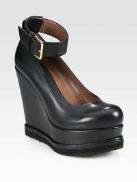 A polished buckle adorns this adjustable ankle strap, on an ultra-high platform silhouette of rich leather. Self-covered wedge with foam insert, 4¾ (120mm)Covered platform, 1½ (40mm)Compares to a 3¼ heel (80mm)Leather upperLeather liningRubber trek solePadded insoleMade in Italy A polished buckle adorns this adjustable ankle strap, on an ultra-high platform silhouette of rich leather. Self-covered wedge with foam insert, 4¾ (120mm)Covered platform, 1½ (40mm)Compares to a 3¼ heel (80mm)Leather upperLeather liningRubber trek solePadded insoleMade in Italy