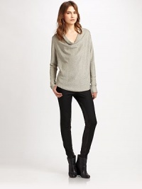 Proof that glamour can come in a simple form, this shimmering metallic knit has an elegantly draped cowlneck and lots of dazzle.CowlneckDropped shouldersLong sleevesContour hem with overcast edgingShirttail back hem90% acetate/10% LurexDry cleanMade in USAModel shown is 5'10 (177cm) wearing US size Extra Small/ Small. Proof that glamour can come in a simple form, this shimmering metallic knit has an elegantly draped cowlneck and lots of dazzle.CowlneckDropped shouldersLong sleevesContour hem with overcast edgingShirttail back hem90% acetate/10% LurexDry cleanMade in USAModel shown is 5'10 (177cm) wearing US size Extra Small/ Small.