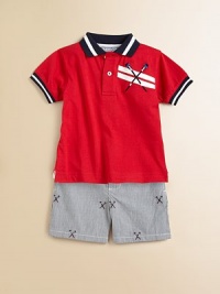 A classic cotton polo design is given a sporty update with crew motif and contrasting stripes.Ribbed polo collarShort sleevesFront button placketUneven side-vented hemCottonMachine washImported Please note: Number of buttons may vary depending on size ordered. A classic cotton polo design is given a sporty update with crew motif and contrasting stripes.Ribbed polo collarShort sleevesFront button placketUneven side-vented hemCottonMachine washImported Please note: Number of buttons may vary depending on size ordered.