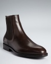 A slip-on boot in smooth Italian leather adds polish to your distinguished look, crafted with care from the classic designer Salvatore Ferragamo.