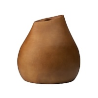 Smoothed to perfection by the hand of a master, this sophisticated vase embodies artisan texture and timeless design. Smoothed to perfection by the hand of a master, this sophisticated vase embodies artisan texture and timeless design.
