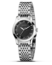 A stainless steel watch from the Gucci G-Timeless collection. Round black dial with pattern and stick hour indices. Sweep second hand and date window. A stainless steel watch from the Gucci G-Timeless collection. Round black dial with pattern and stick hour indices. Sweep second hand and date window.