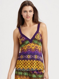 A vibrant tribal-inspired print pairs with contrasting solid trim in this easy summer essential. V-neck with solid trimSleevelessFront shirringAbout 25¼ from shoulder to hem90% viscose/10% elastaneHand washMade in Italy A vibrant tribal-inspired print pairs with contrasting solid trim in this easy summer essential. V-neck with solid trimSleevelessFront shirringAbout 25¼ from shoulder to hem90% viscose/10% elastaneHand washMade in Italy