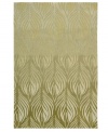 A soothing leaf design is carved into an ombré green ground, evoking modest and elegant style in this area rug from Nourison. Hand tufted of long polyester fibers for added strength and softness, the Contour area rug creates an ideal accent for any modern room. (Clearance)