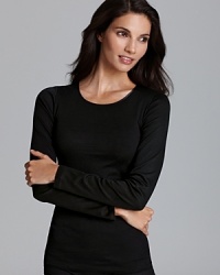 Seamless and soft, Hanro's long sleeve shirt is the making for a good night's sleep. Seamless and soft, Hanro's long sleeve shirt is the making for a good night's sleep.