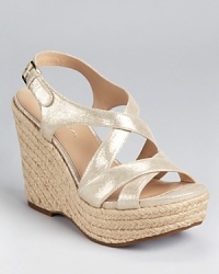 In sparkling suede, these Via Spiga wedges add a casual shimmer that lasts all day (and all night) long. In sparkling suede, these Via Spiga wedges add a casual shimmer that lasts all day (and all night) long.