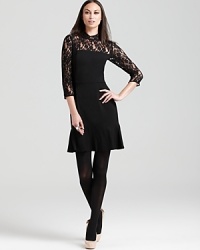 Sheer lace lends provocative edge to this DKNY dress, finished with a ruffled hemline for a darling yet dramatic look. Sheer lace lends provocative edge to this DKNY dress, finished with a ruffled hemline for a darling yet dramatic look.
