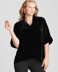 Go va va voom in a velvet Eileen Fisher Plus top, artfully draped with a chic cowl neckline for effortless elegance.