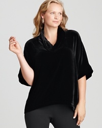 Go va va voom in a velvet Eileen Fisher Plus top, artfully draped with a chic cowl neckline for effortless elegance. Go va va voom in a velvet Eileen Fisher Plus top, artfully draped with a chic cowl neckline for effortless elegance.