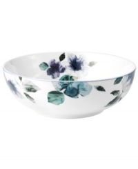 Watercolor florals adorn the canvas of white porcelain that is Mikasa's Paradise Bloom vegetable bowl. A simple silhouette and band of blue complete this essential part of the everyday dinnerware collection.