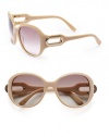 THE LOOKRound silhouetteAcetate framesCutout metal logo detail at templesUV protectionSignature case includedTHE COLORPink beige frames with with light brown gradient lensesORIGINMade in France