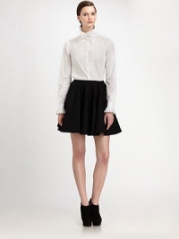 Sharp, artfully tailored pleats circle the collar and cuffs of this elegant cotton style.Pleated stand collarConcealed button frontAbout 24 from shoulder to hemCottonDry cleanMade in Italy of imported fabricModel shown is 5'10 (177cm) wearing US size 4. Sharp, artfully tailored pleats circle the collar and cuffs of this elegant cotton style.Pleated stand collarConcealed button frontAbout 24 from shoulder to hemCottonDry cleanMade in Italy of imported fabricModel shown is 5'10 (177cm) wearing US size 4.