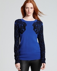 Tigers team up for high style on this Torn by Ronny Kobo sweater, coolly contrasting with a bold, bright hue. Tigers team up for high style on this Torn by Ronny Kobo sweater, coolly contrasting with a bold, bright hue.