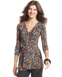 Simple geometry: Ellen Tracy's bright tunic is the perfect thing with sleek black pants. (Clearance) Simple geometry: Ellen Tracy's bright tunic is the perfect thing with sleek black pants. (Clearance)
