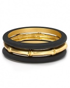 Inject effortless eclecticism into your look with this bracelet trio from T Tahari. With contrasting resin and gold tones, this set lends itself to stylish stacking.